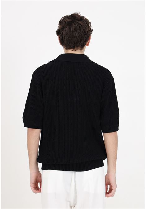 Black men's polo shirt with perforated texture and loose knit IM BRIAN | MA2805009